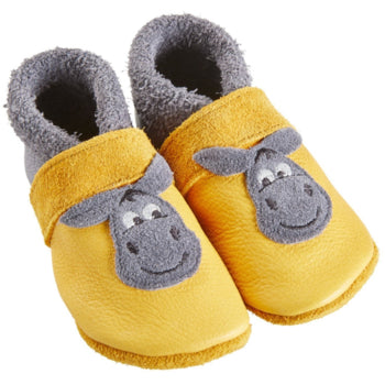Baby slippers made of Ecopell leather with donkey faces on soft shoes.