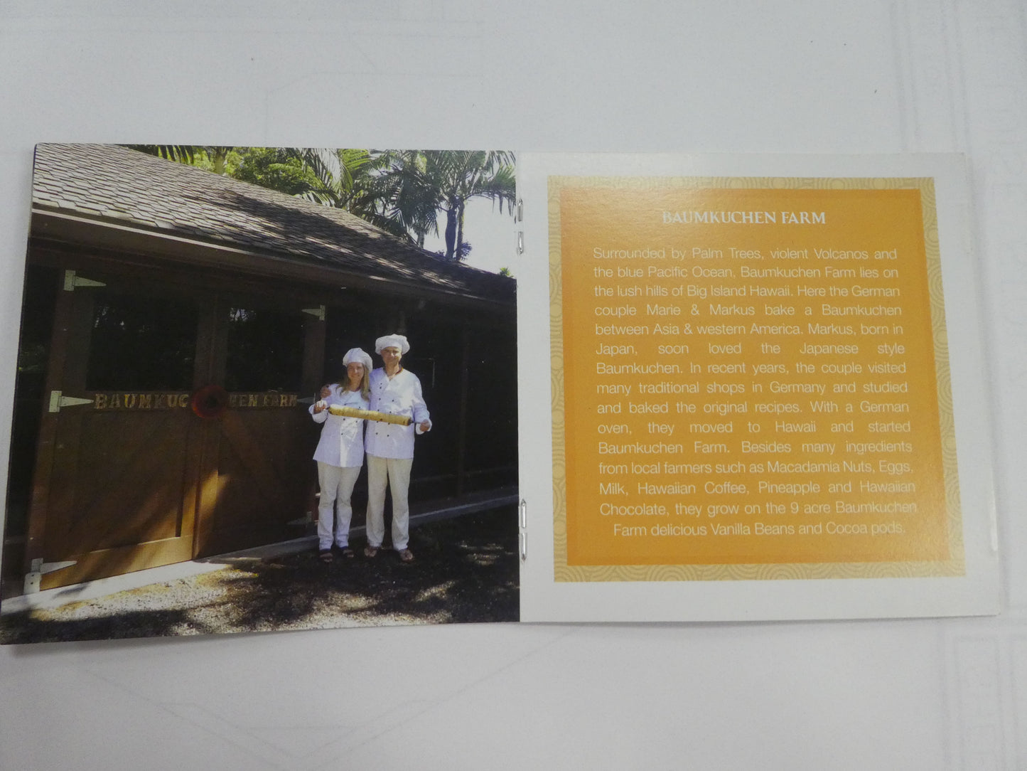 Brochure with photo of Baumkuchen Farm founders in Hawaii—sharing their unique fusion of German-Japanese cake tradition.