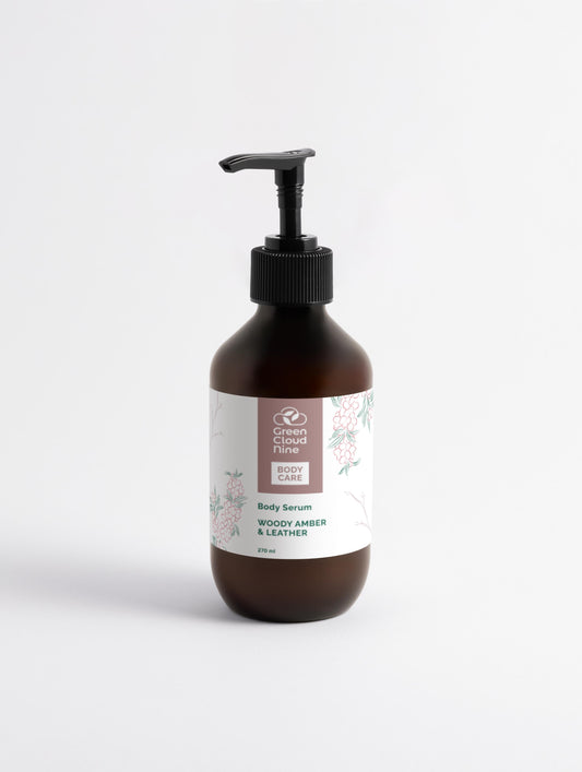 Brown bottle with pump and floral label on a white background