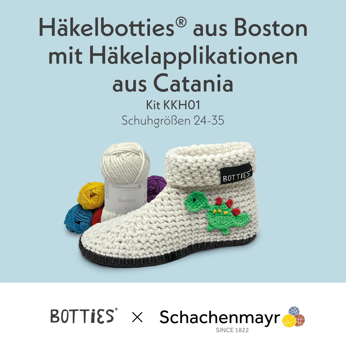 Crochet boot kit with cream wool, black soles, colorful yarn, and a green dinosaur applique. Botties x Schachenmayr collaboration.