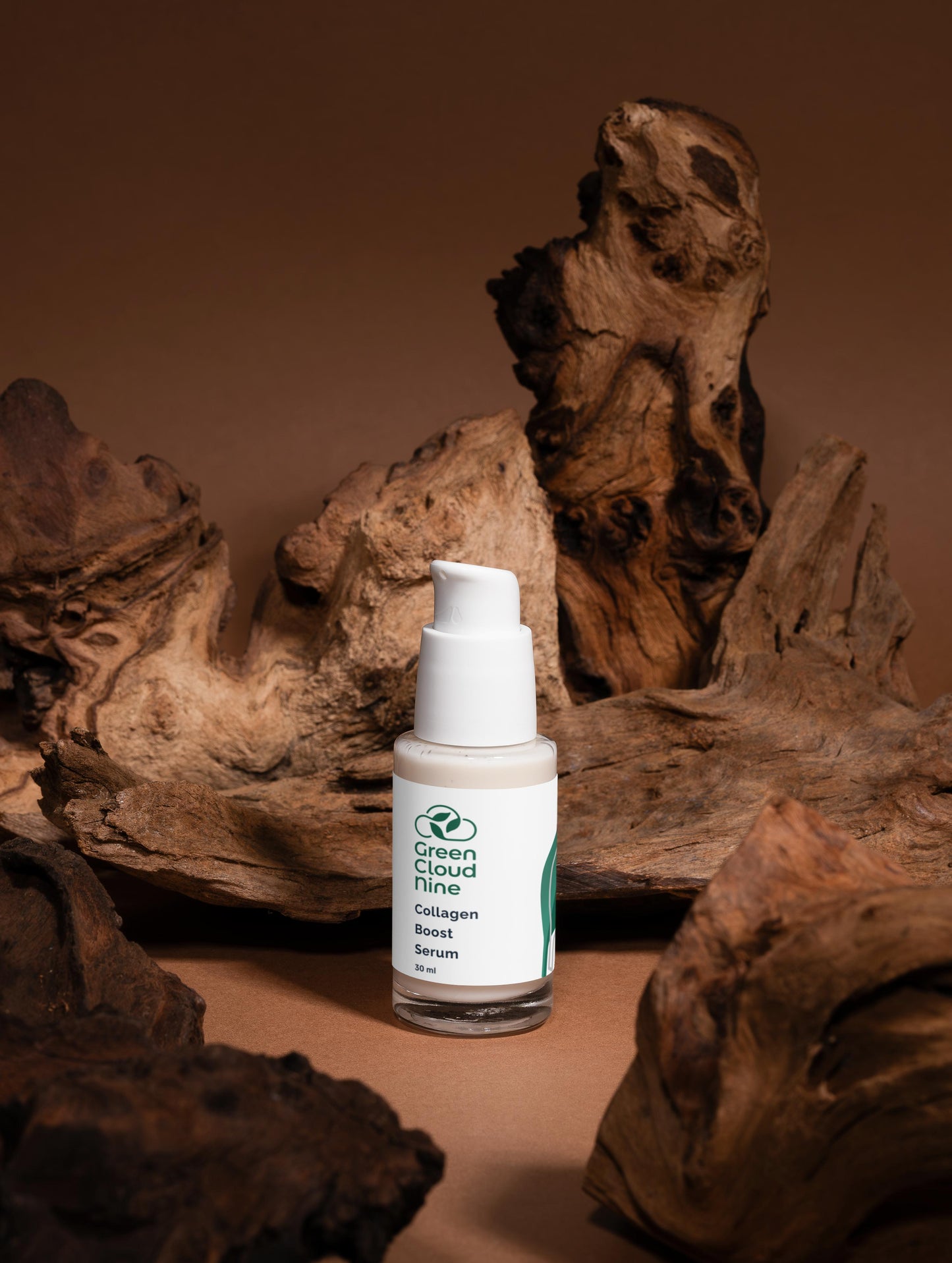 Skincare serum bottle with a label on a brown background with natural wood elements