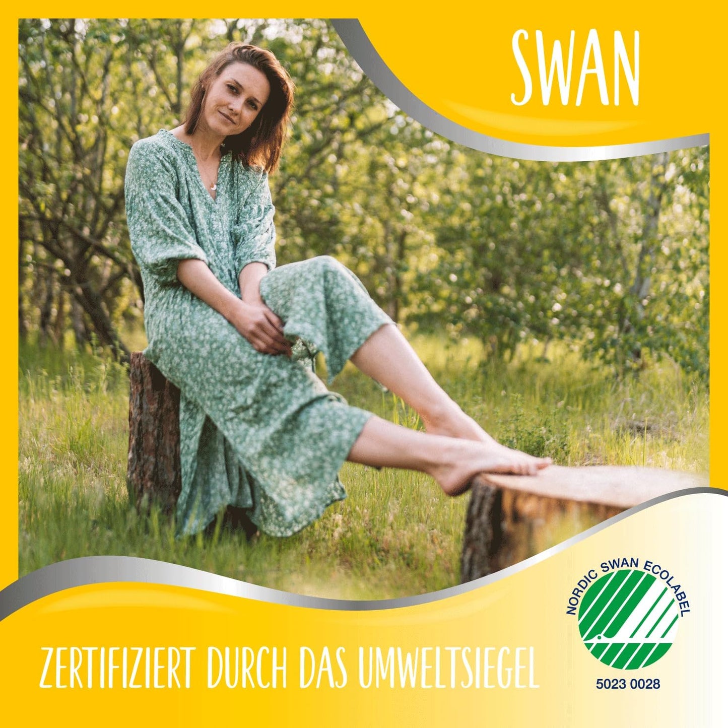 Woman in a green floral dress sitting on a log in a forest, with the Nordic Swan Ecolabel certification for eco-friendly products.