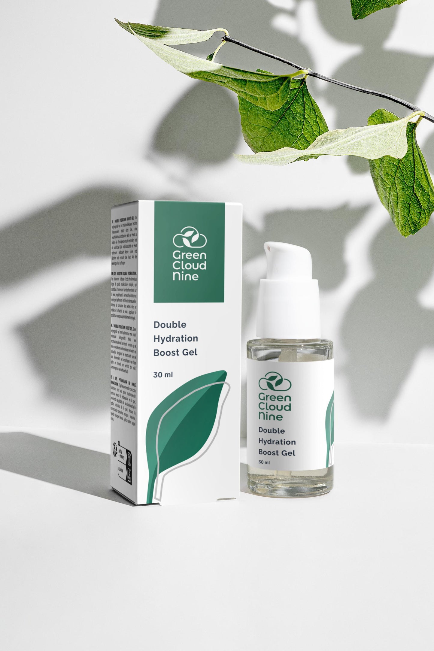 Double Hydration Boost Gel with box. White pump with green cloud nine logo on a white background with plants