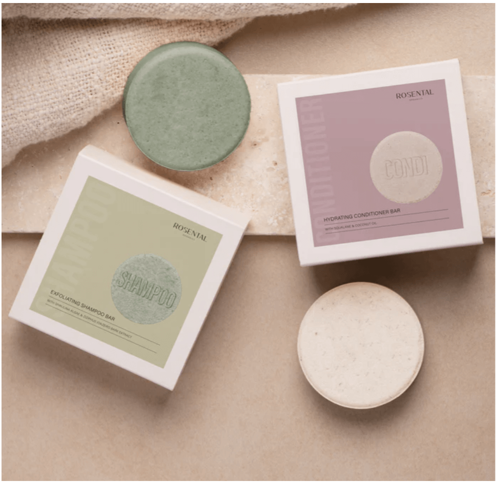 Rosental Exfoliating Shampoo Bar and Hydrating Conditioner Bar duo, eco-friendly solid haircare on neutral background.