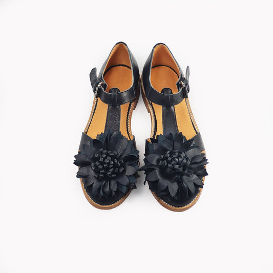 Handmade 100% Leather fisherman sandals in black with flower detail on the front and ankle strap.