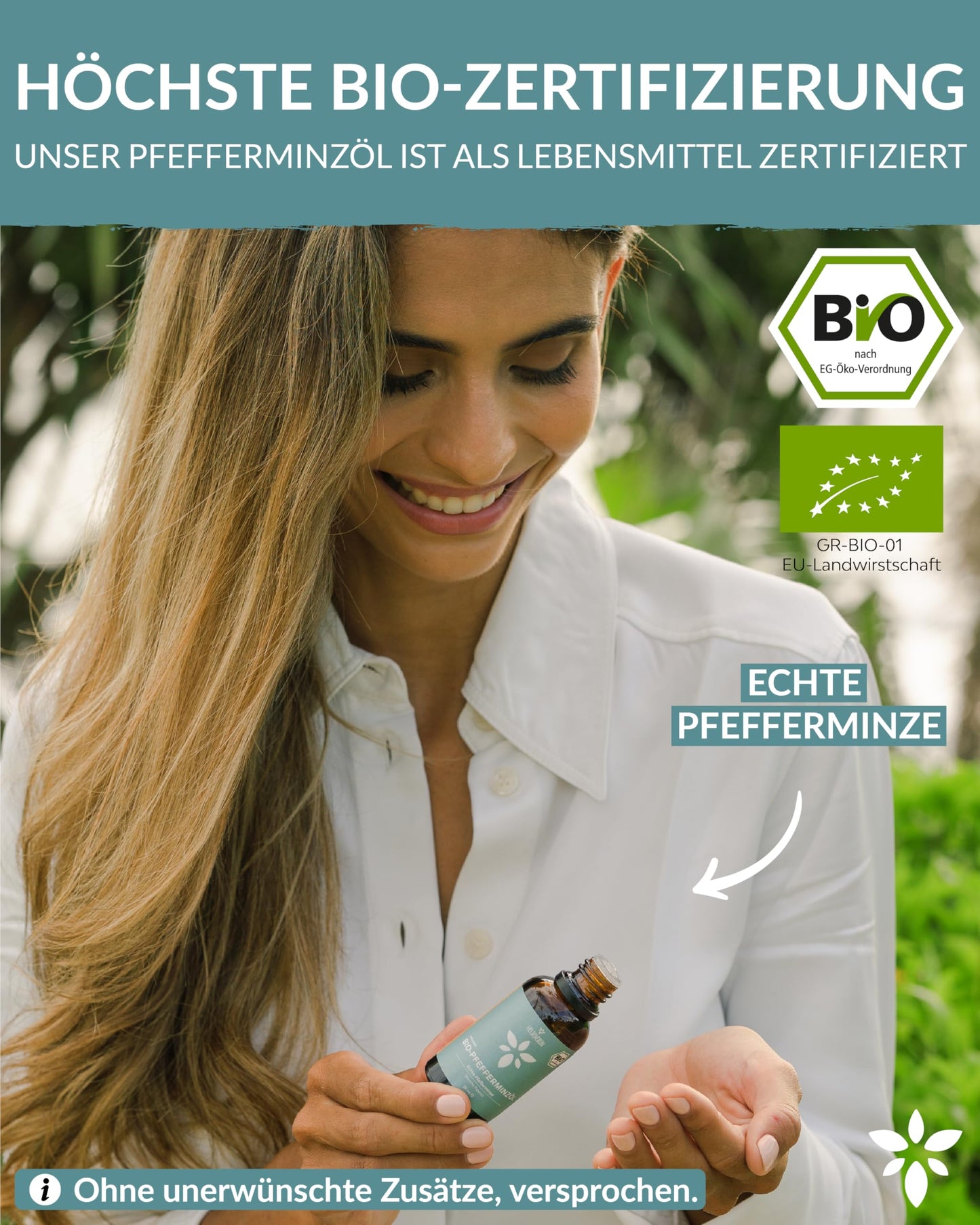A woman holding a bottle of Heldengrun Organic Essential Oil 30ml