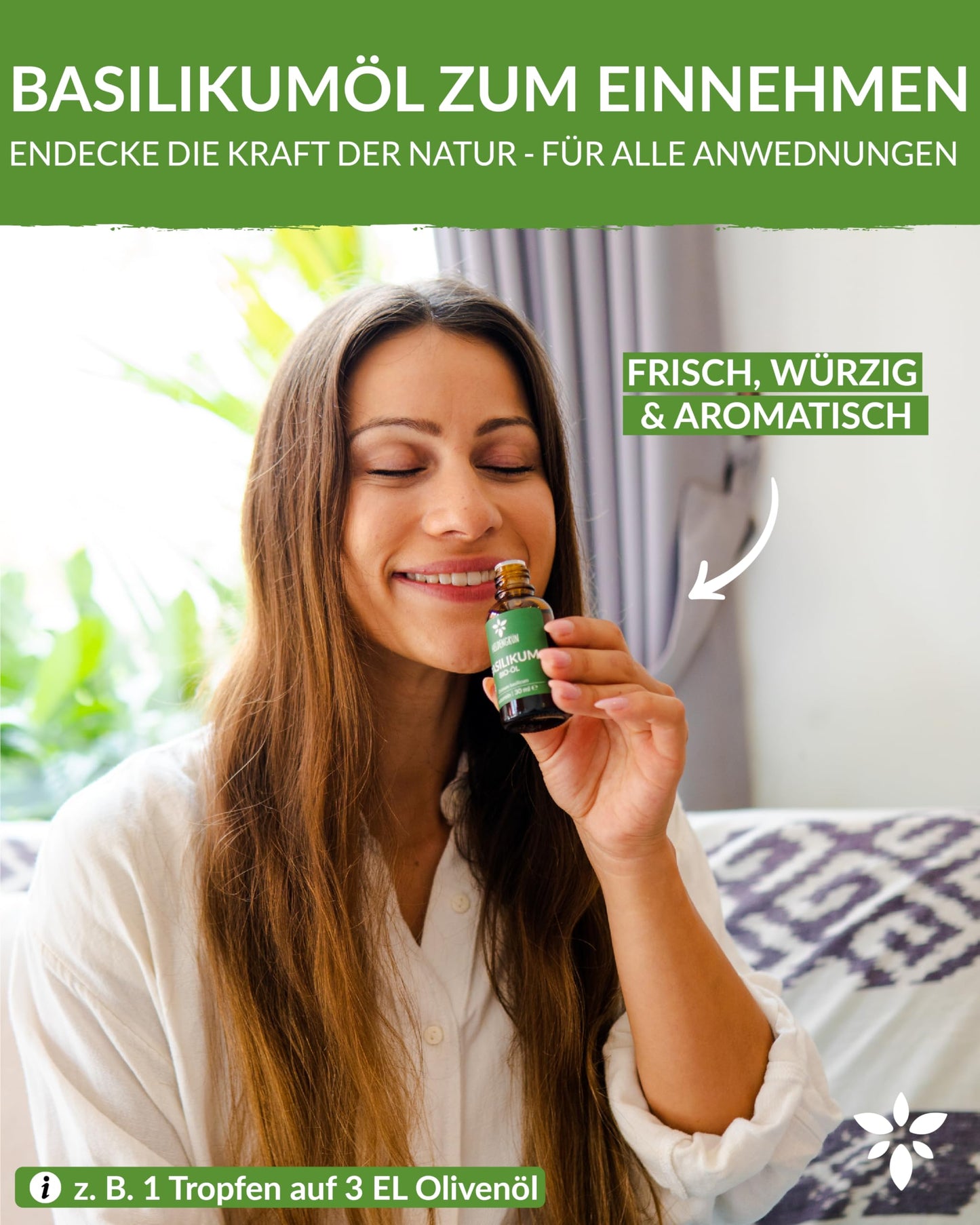 A womanholding a bottle of Heldengrun Organic Essential Oil 30ml basilikum