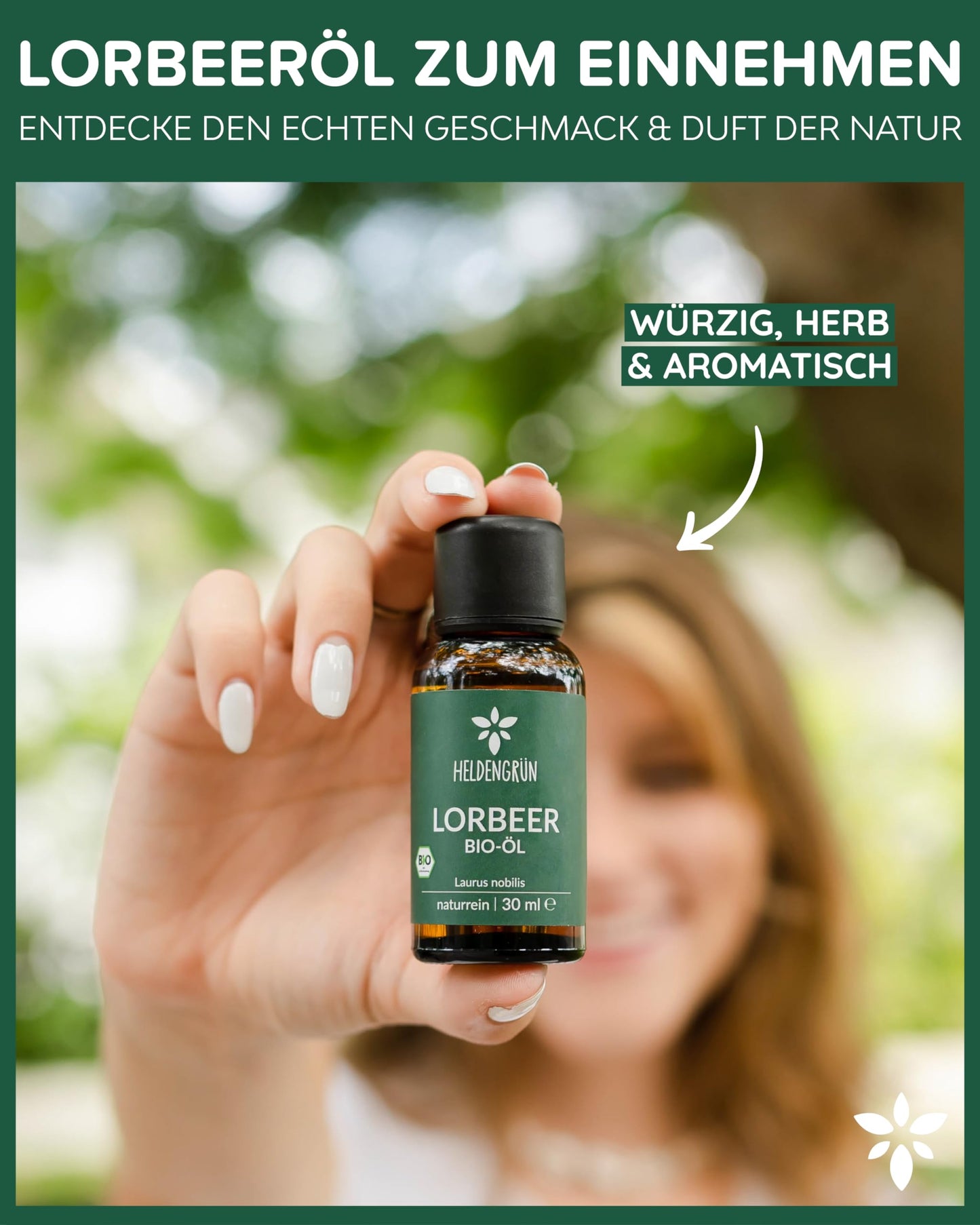 A woman holding a bottle of Heldengrun Organic Essential Oil 30ml lorbeer