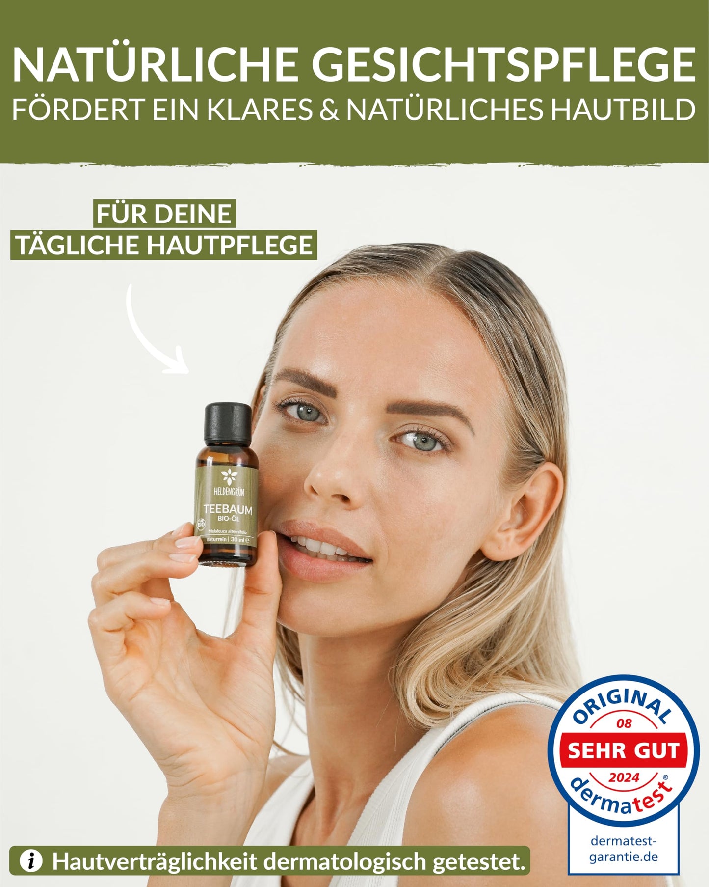 A woman holding of Heldengrun Organic Essential Oil 30ml teebaum