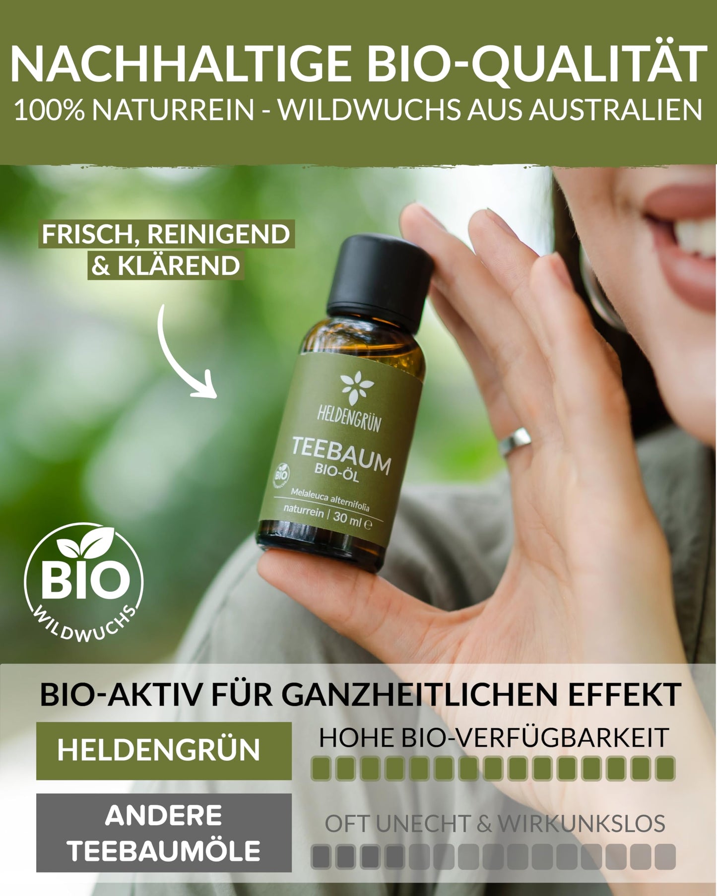 A woman holding a bottle of Heldengrun Organic Essential Oil 30ml teebaum