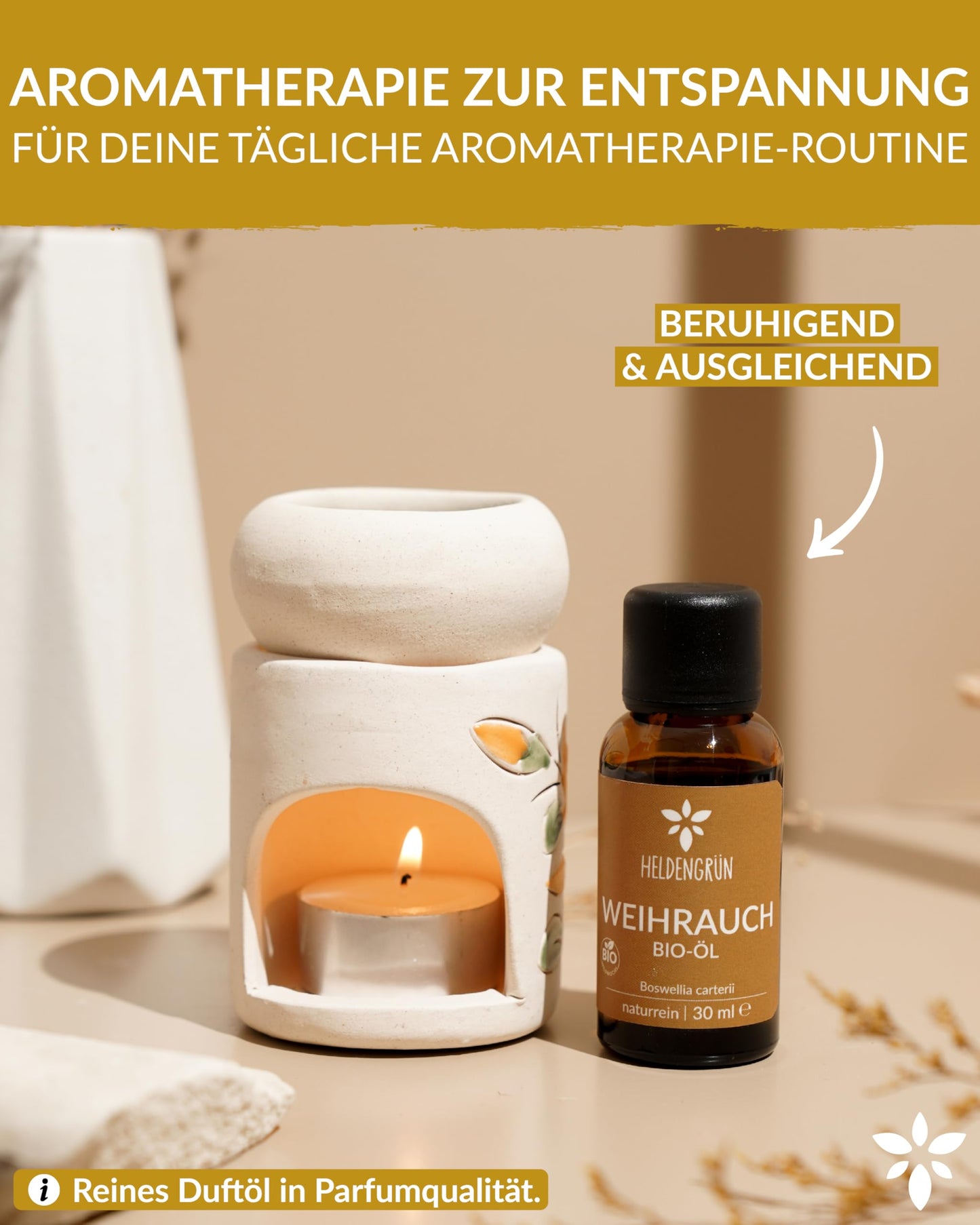 A candle and a bottle of Heldengrun Organic Essential Oil 30ml weihrauch