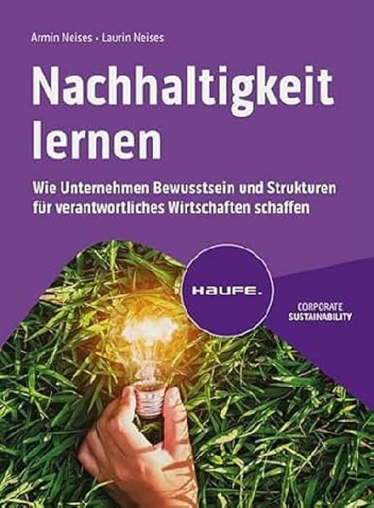 Book cover with a hand holding a glowing bulb over grass, symbolizing sustainable business ideas. Purple background.