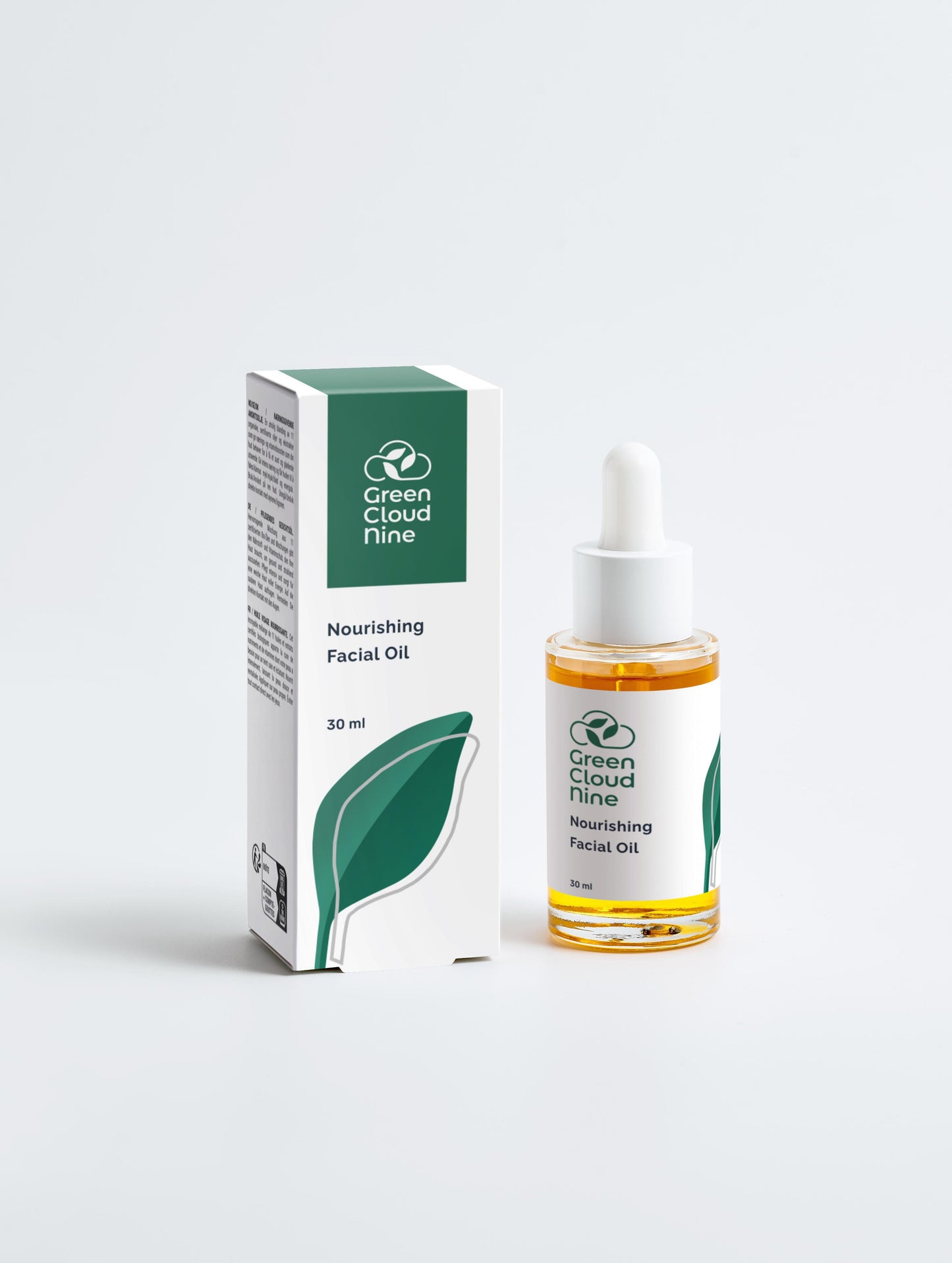 Nourishing facial oil bottle and packaging with 'Green Cloud Nine' logo on a white background (front)