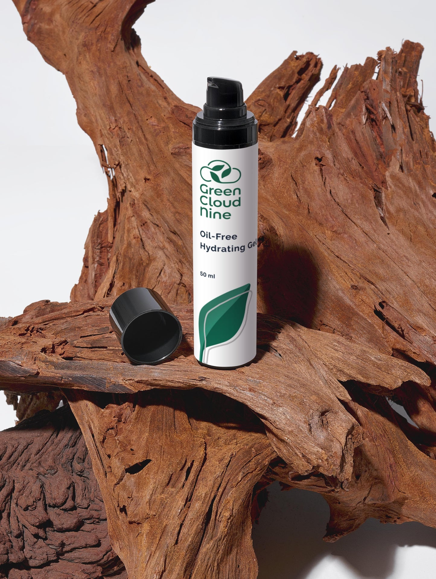 Green Cloud Nine Oil-Free Hydrating Gel standing on drifted wood