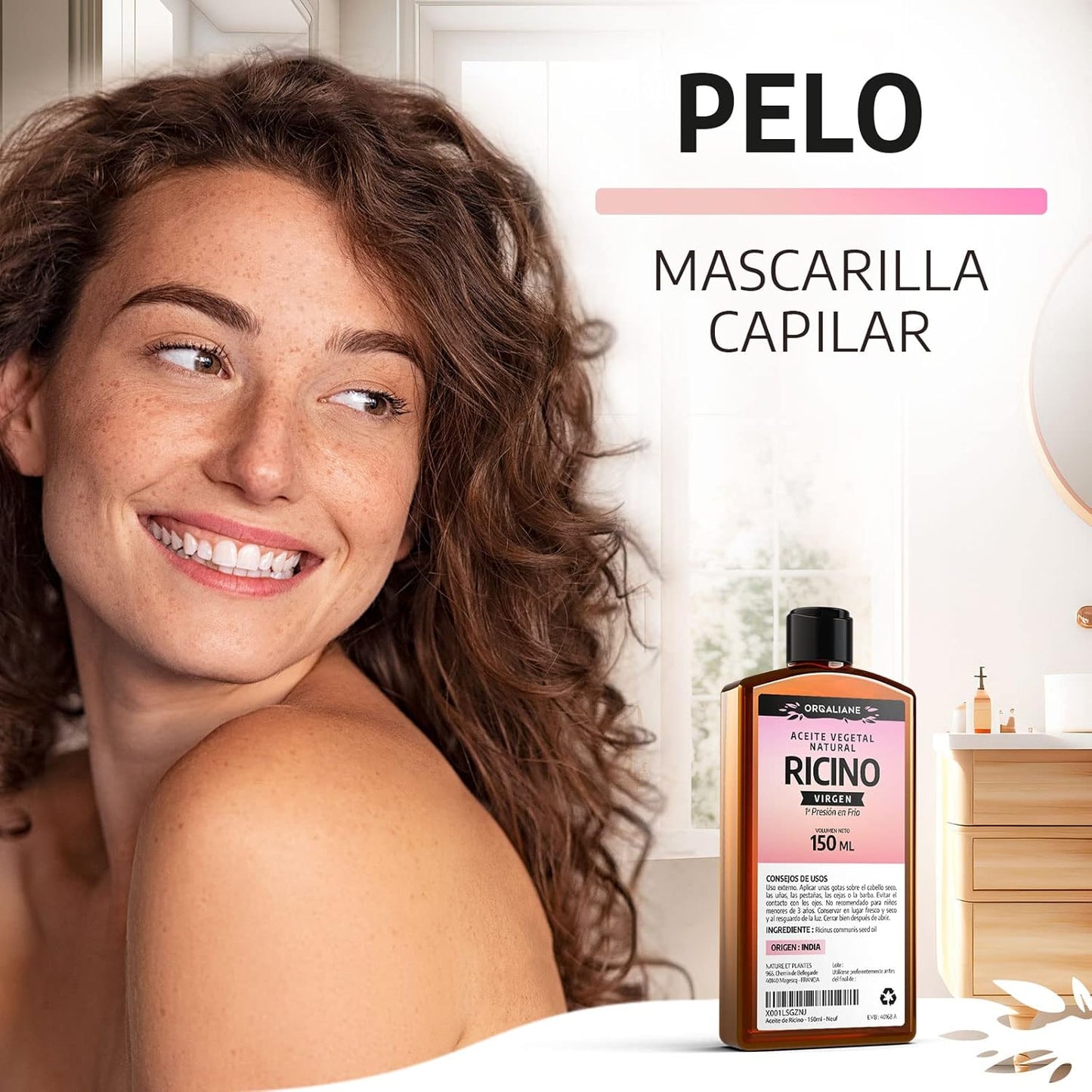 Smiling woman with a bottle of Organic Cold-Pressed Castor Oil