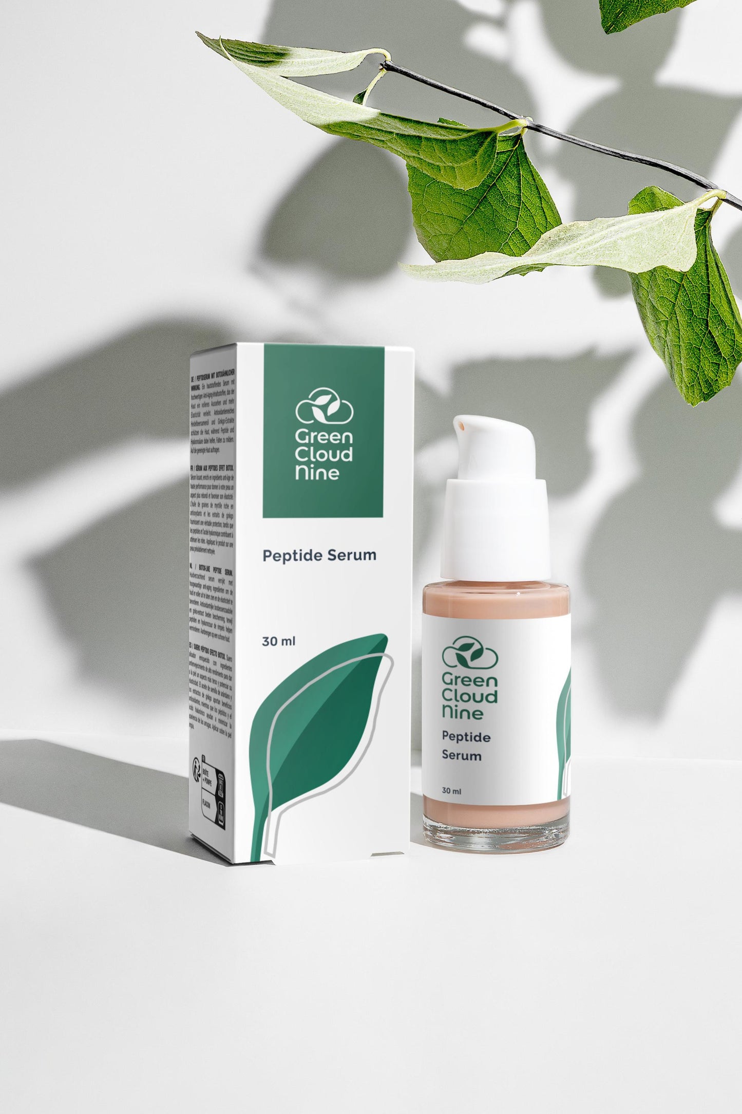 Green Cloud Nine Peptide Serum with packaging on a light background (front)
