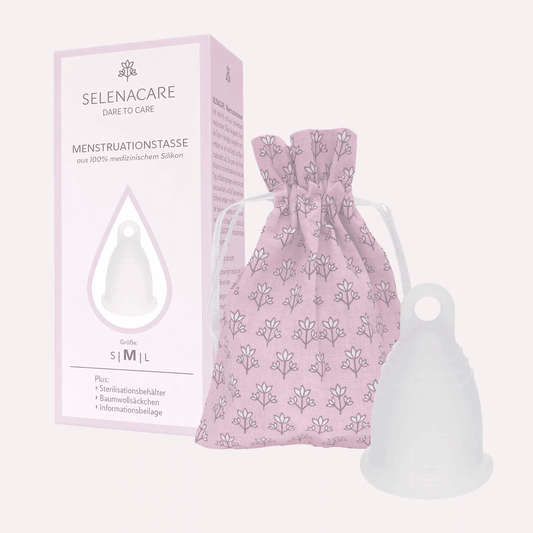 Reusable menstrual cup with cotton bag and box. Eco-friendly, leak-proof, and easy to clean.