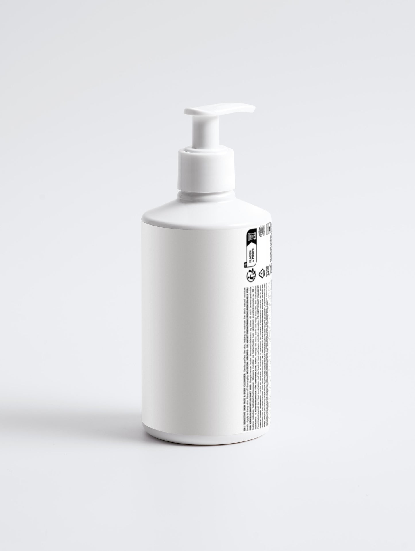 Sensitive Skin Face & Body Cleanser back 190ml in a white pump bottle with Green Cloud Nine Logo on a white background