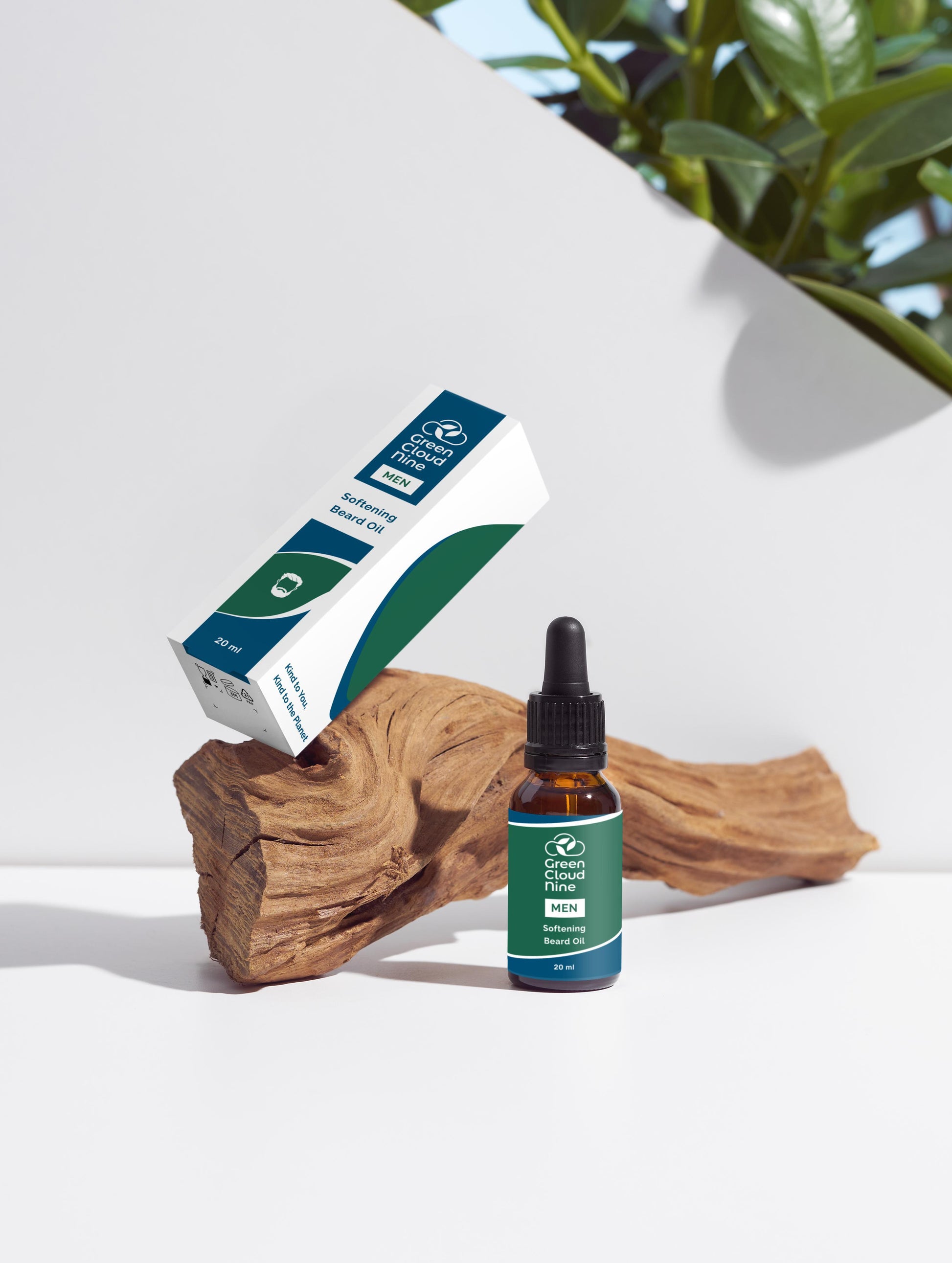 Softening Beard Oil glass dropper bottle with Green Cloud Nine logo on a white background with plants, displayed on wood