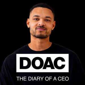 A man in a dark shirt on a black background from The Diary of a CEO cover