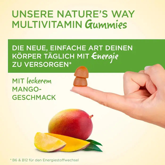 Hand balancing two mango-flavored gummies on fingertip, promoting daily energy with vitamins B6 and B12 from Nature’s Way