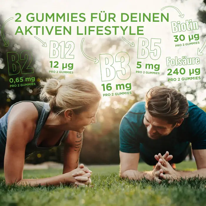 Smiling couple planking in the grass, promoting energy with B2, B3, B5, B12, folic acid, and biotin from just 2 daily gummies