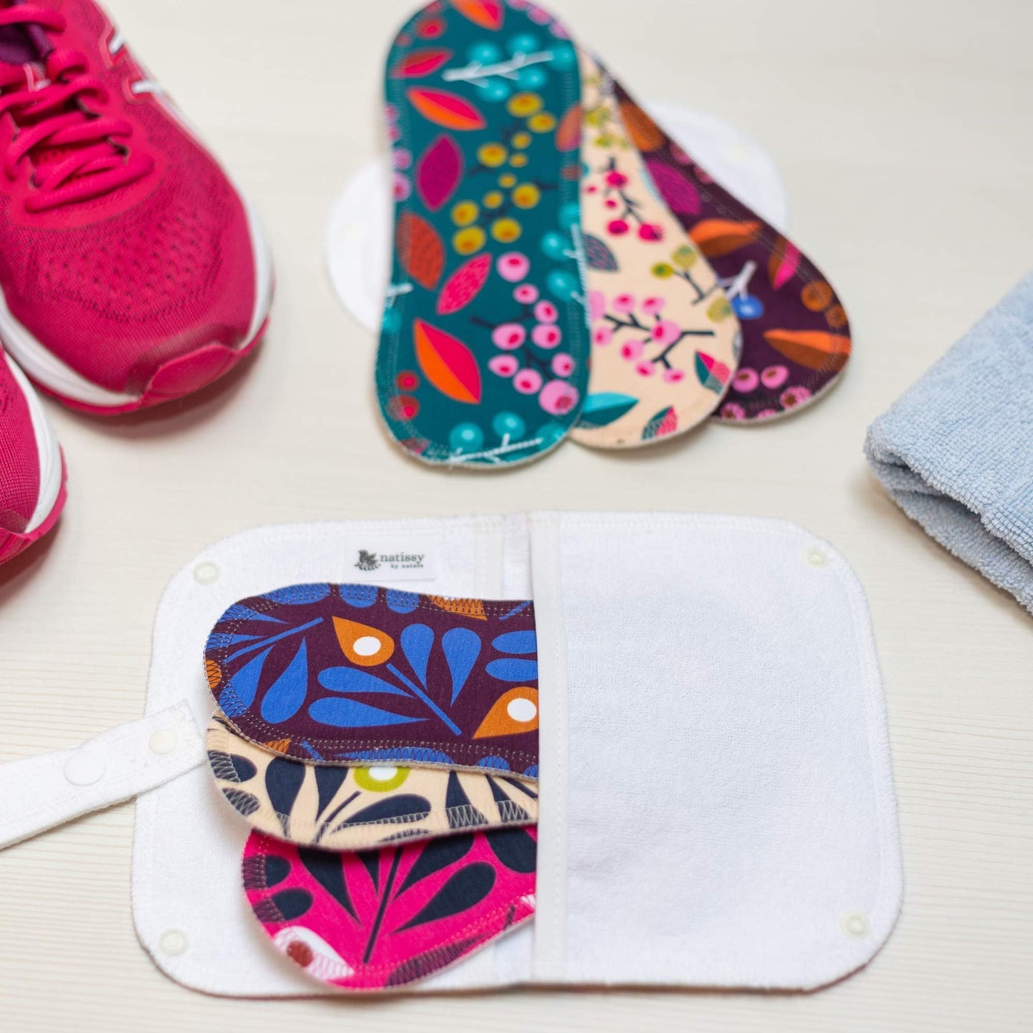 Pink sneakers with Washable Organic Cotton panty liners with wings