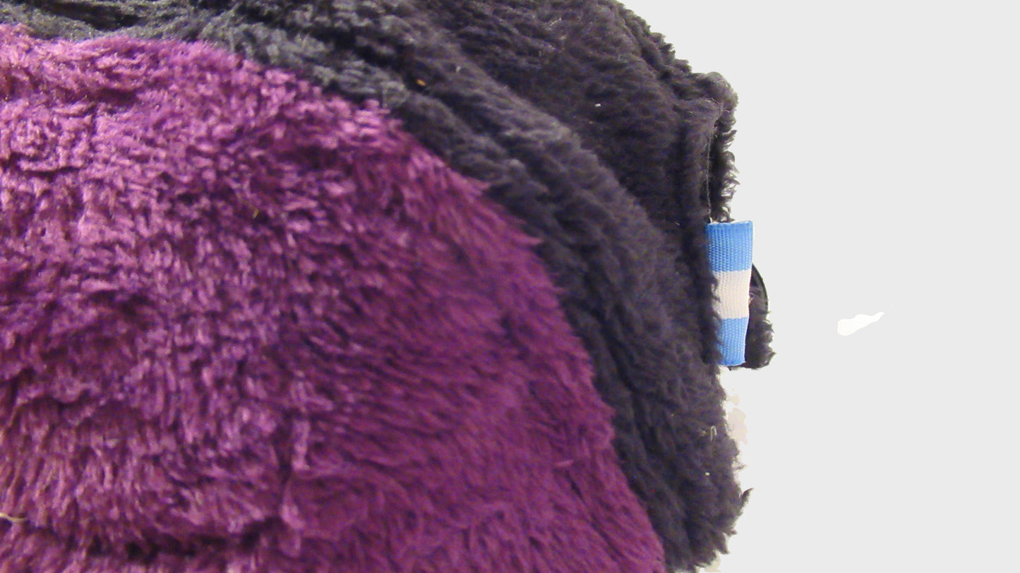 Zig Zag upcycled black purple cap. made from repurposed textiles, combining sustainability, durability, and style for an eco-friendly fashion choice