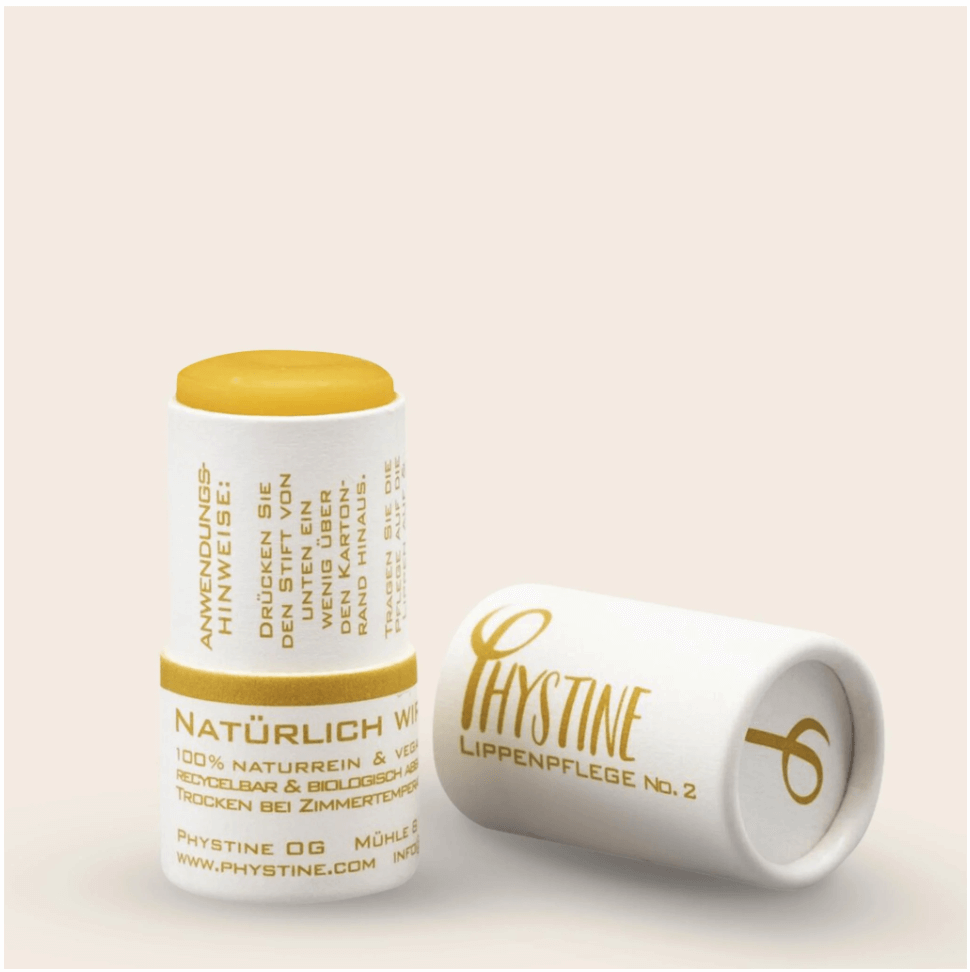 Phystine Lip Care No.2 in eco-friendly packaging open, a natural, vegan lip balm with orange and sea buckthorn for soft lips.