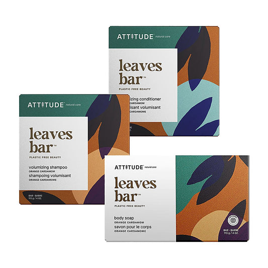 Plastic-free travel kit with shampoo, conditioner & soap bars in citrus-cardamom scent. (