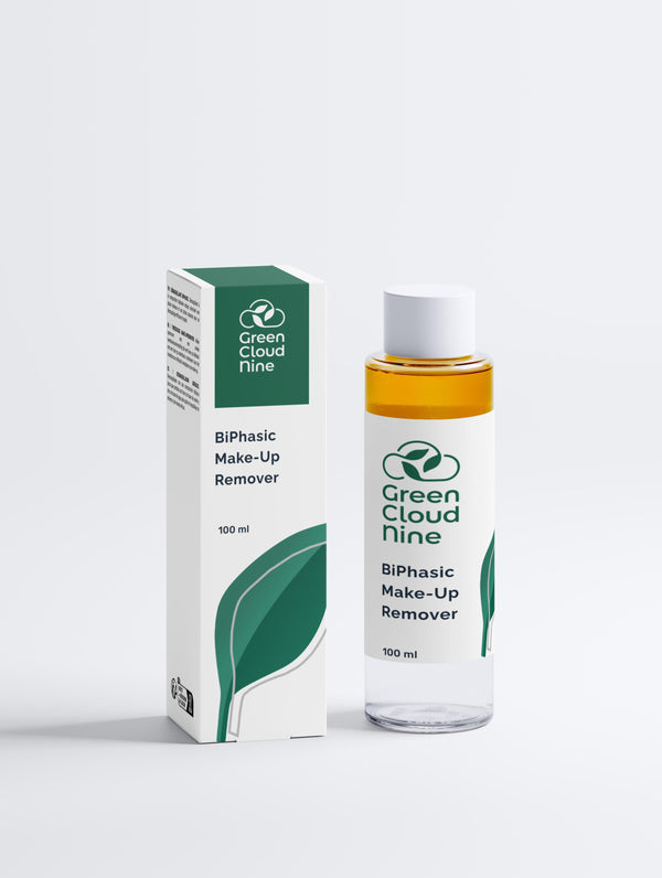 A sleek bottle with box of Green Cloud Nine Biphasic Make-Up Remover on a white background
