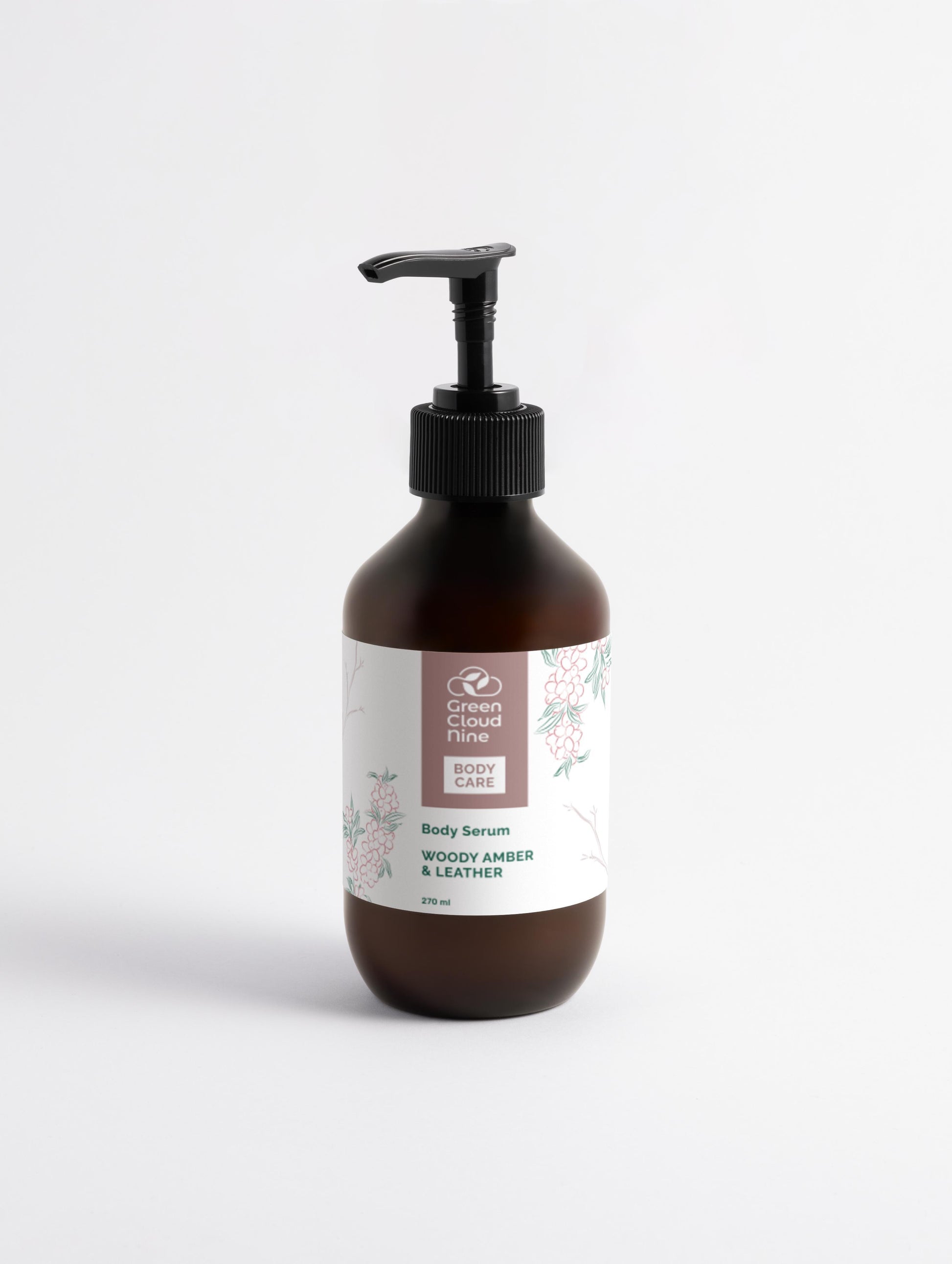 Brown bottle with pump and floral label on a white background