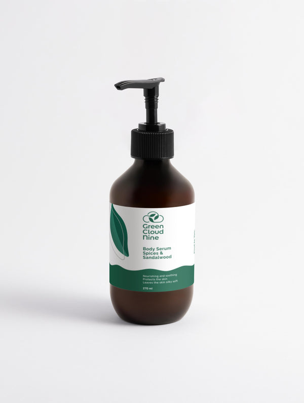 Body cream spices & sandalwood white label on a brown pump bottle with Green Cloud Nine logo 