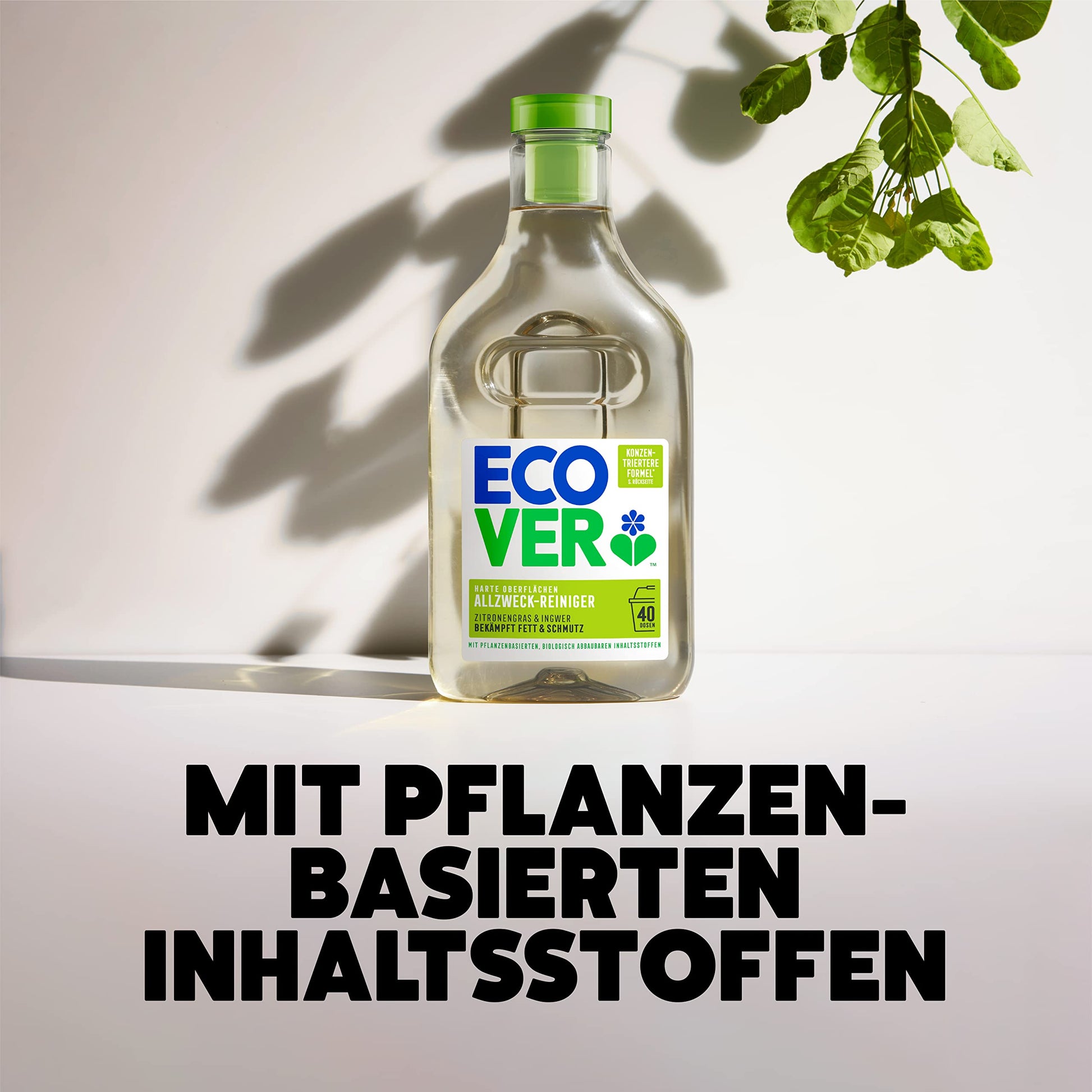 Ecover All Purpose Cleaner in a sustainable bottle with plant-based ingredients, set against a white wall with green leaves
