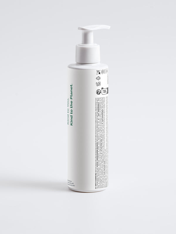 Gentle Cleansing Milk in a white bottle with Green Cloud Nine logo, and shows a list of key ingredients (Back View).