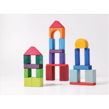 Colorful Grimm’s wooden blocks arranged into creative structures