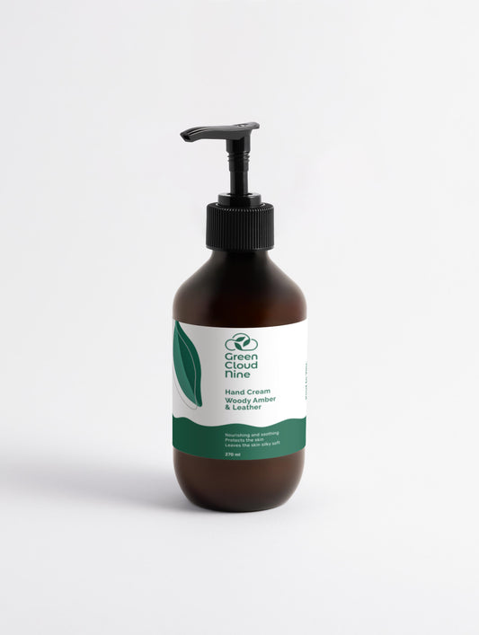 and Cream Woody Amber & Leather front white label on a brown pump bottle with Green Cloud Nine Logo natural ingredients vegan 