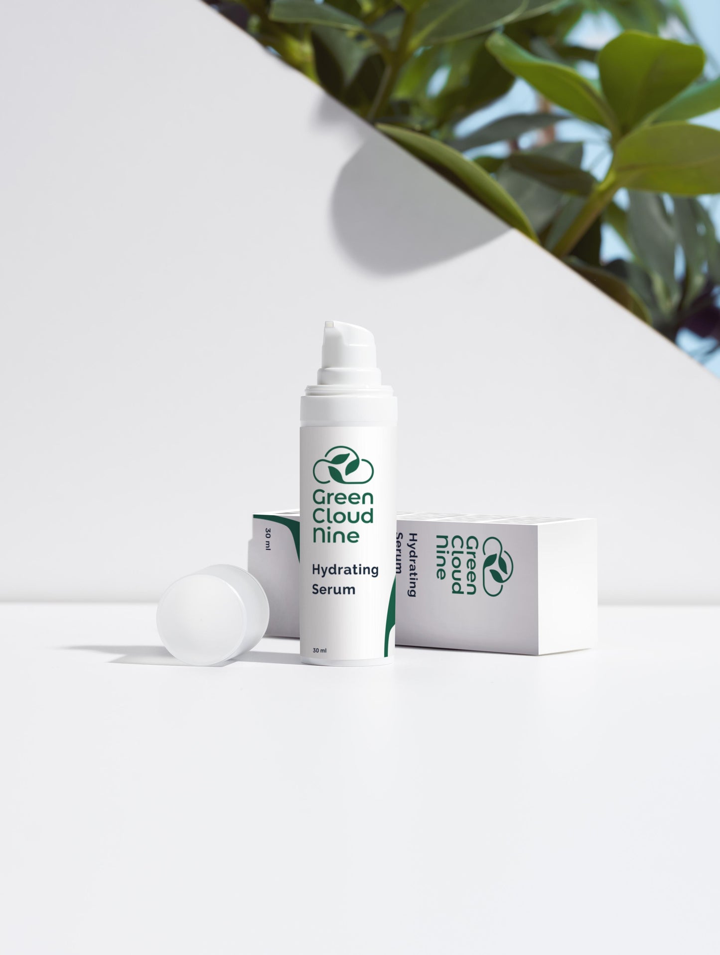 Hydrating Serum with box. White pump with green cloud nine logo on a white background with plants