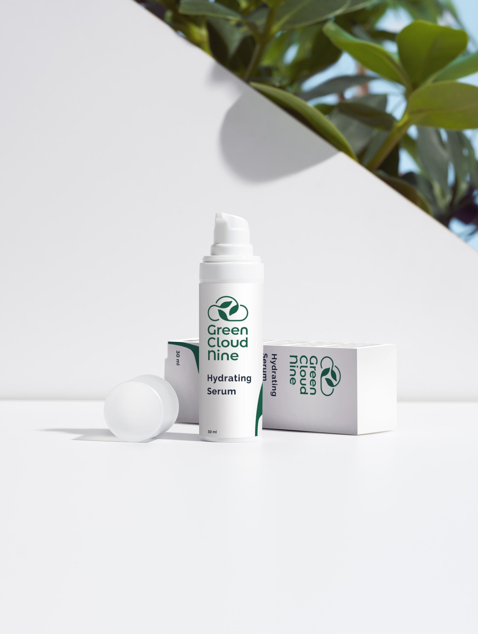 Hydrating Serum with box. White pump with green cloud nine logo on a white background with plants