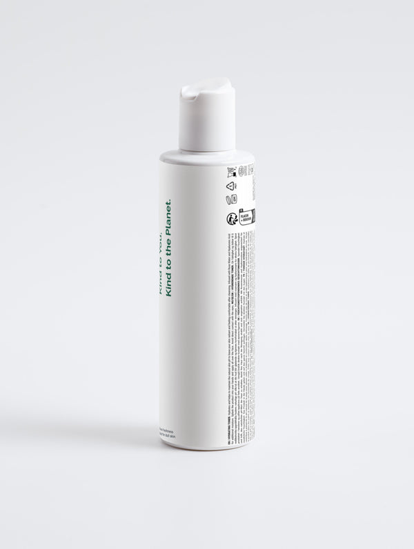 Hydrating toner in a white bottle, showing Green Cloud Nine logo and a large leaf. Featuring key ingredients. The bottle is depicted against a white background. (Back View)