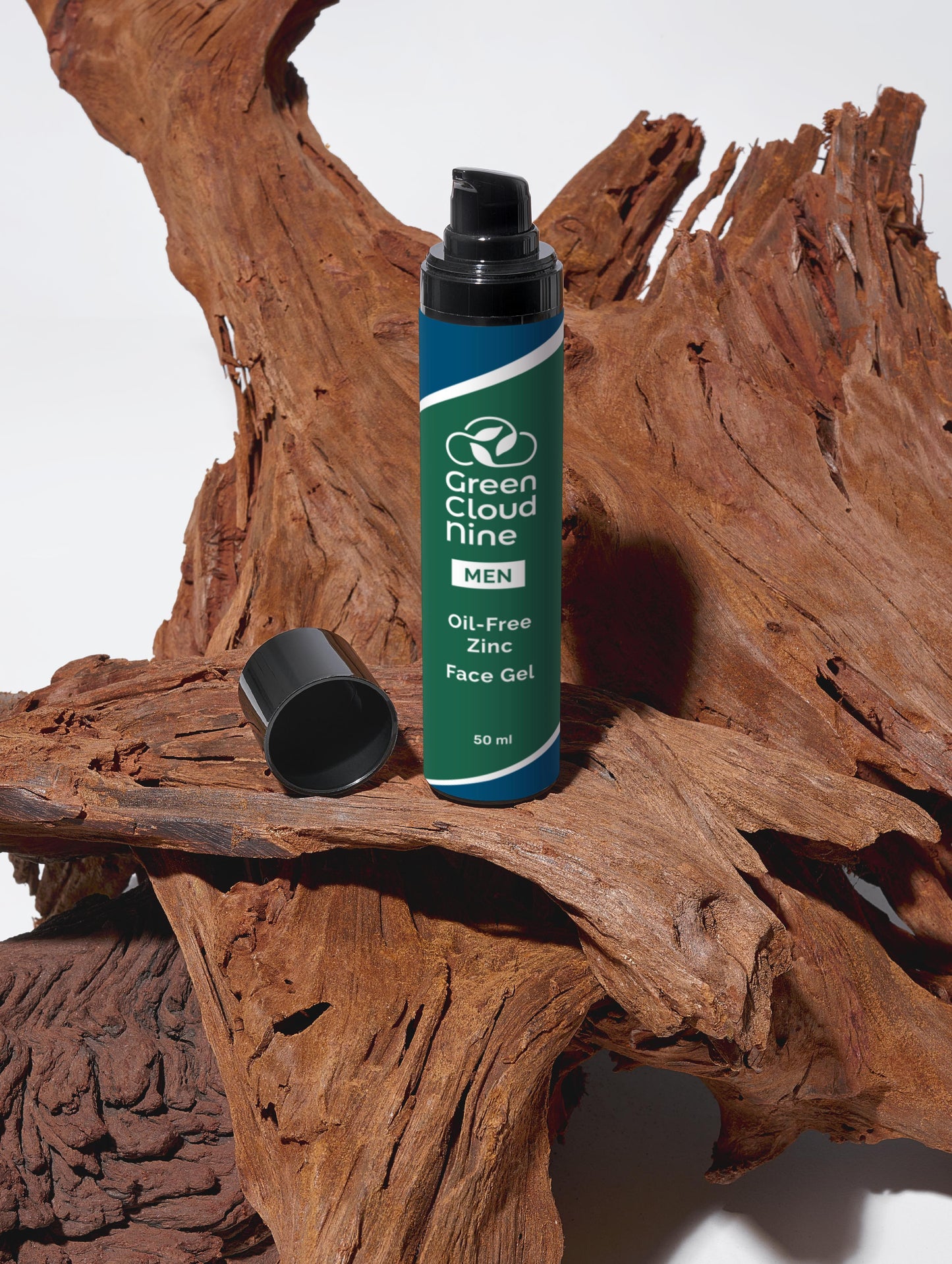Green Cloud Nine Oil-free Zinc Face Gel standing on drifted wood