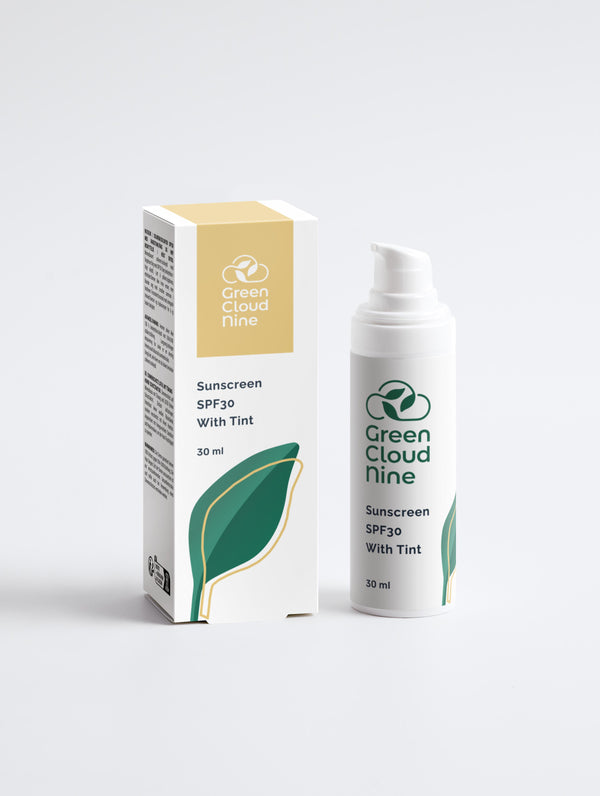 Sunscreen SPF30 With Tint with box in a white pump bottle with Green Cloud Nine Logo, on a white background
