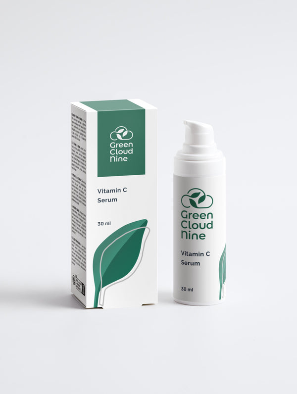Vitamin C Serum with box  in a white pump bottle with Green Cloud Nine Logo