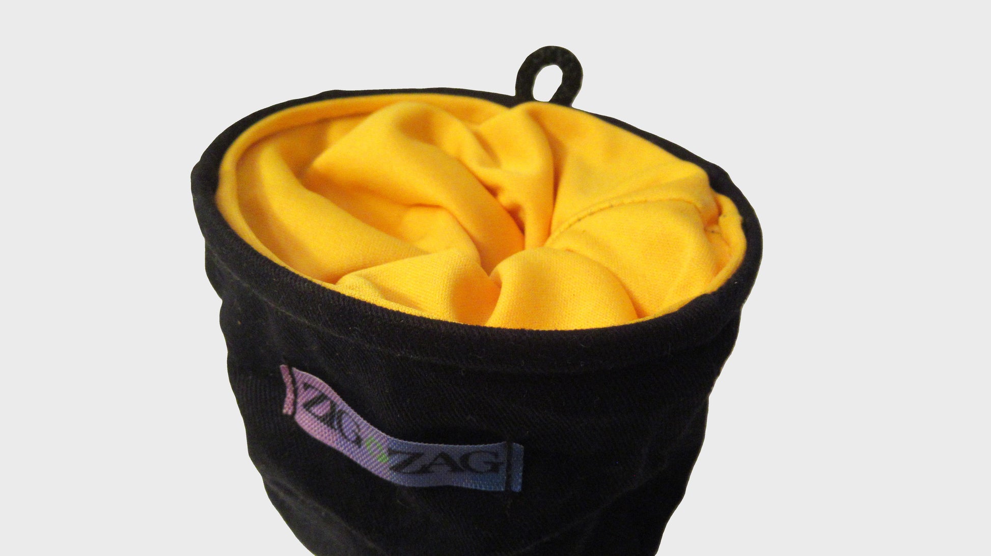 Zig Zag upcycled yellow and black chalk bag. made from repurposed textiles, combining sustainability, durability, and style for an eco-friendly fashion choice