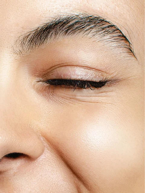 Close-up of a person's eye with eyeliner. For KIND Rituals